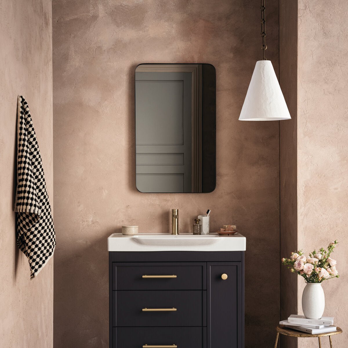 Silver Needle dark navy bathroom vanity with gold-toned handles and white ceramic sink for elegant bathroom decor
