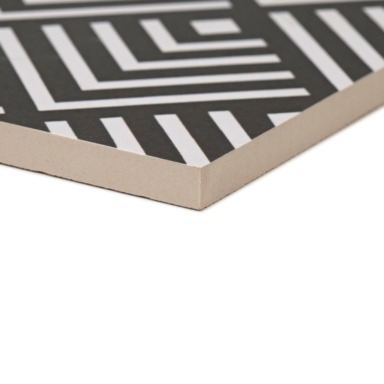 Black and white geometric patterned matte porcelain tile in hexagonal shape from sorrento correale collection