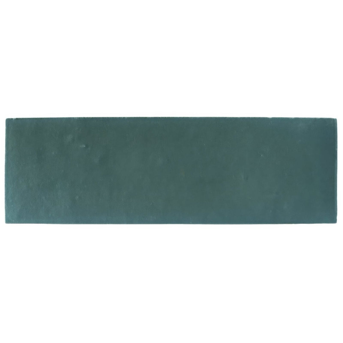 A rectangular matte-finished dark teal ceramic tile with subtle texture from south cliff teal brick tile collection