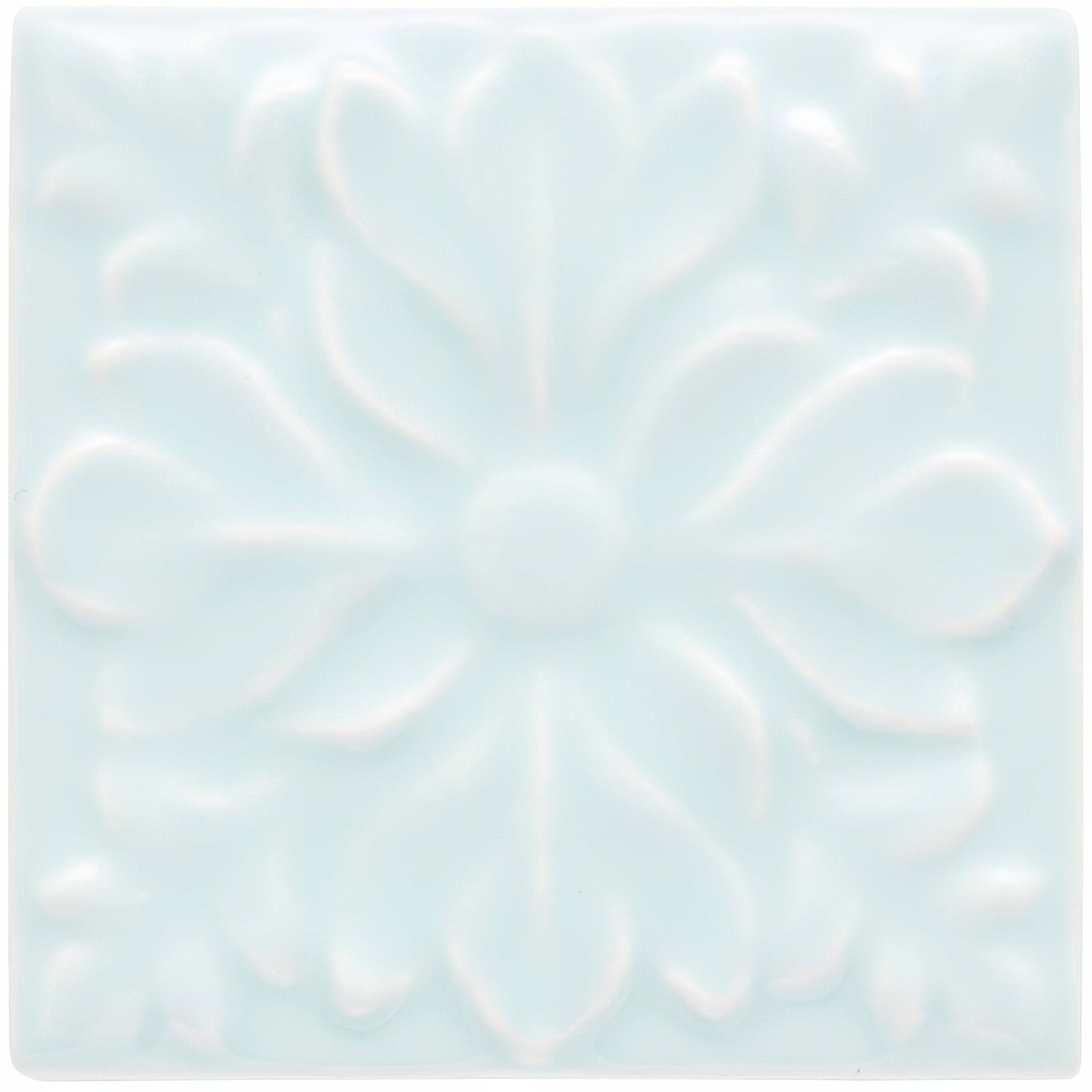 A square light blue ceramic tile with a raised floral pattern from the Southwold Hampstead collection