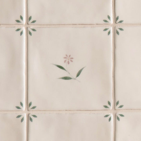 Cream-colored ceramic spring lucie 13 x 13cm tiles with delicate hand-painted soft pink and green floral motifs