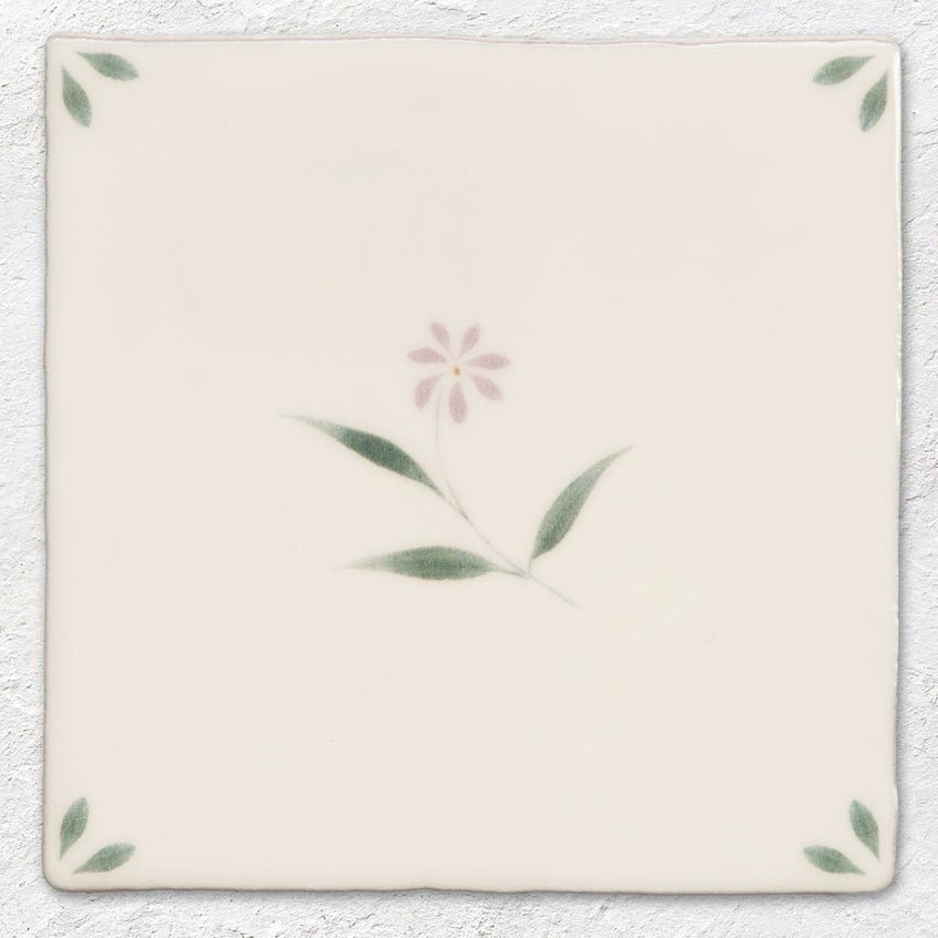 Cream-colored ceramic tile spring Lucie 13 x 13cm with delicate hand-painted pink flower and green leaves design