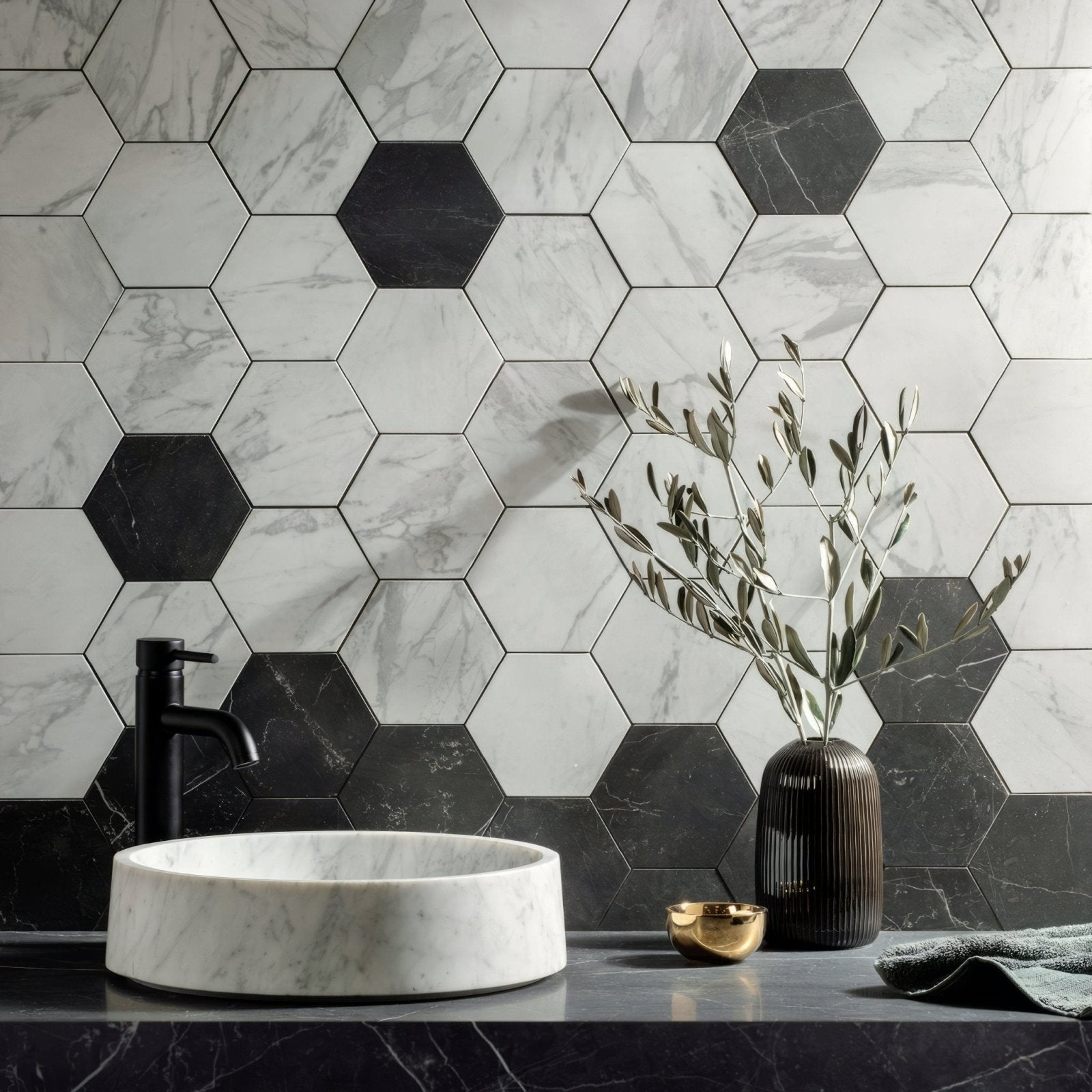 Statuarietto Honed Hexagon Mosaic white marble hexagonal mosaic with a white vessel sink and black tap