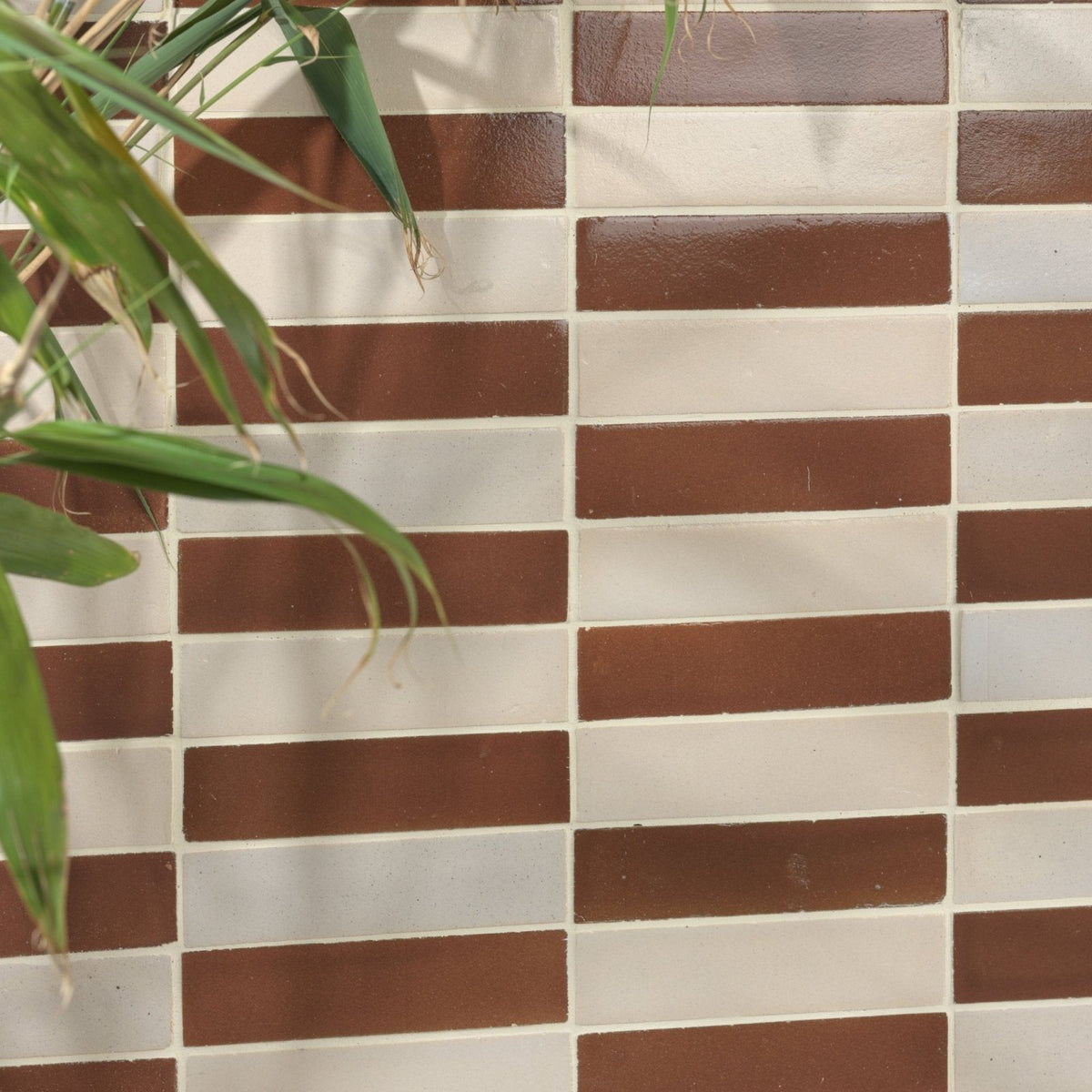 Brown and white rectangular mosaic tile wall with stone glaze ceramic cola gloss brick finish