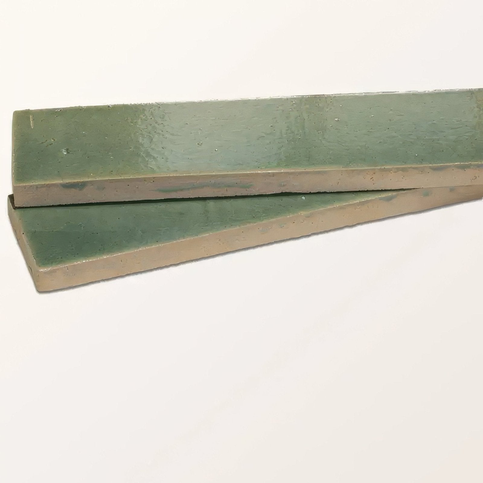 Two rectangular stone glaze ceramic menthol gloss brick tiles with matte sage green glaze and beige ceramic edges