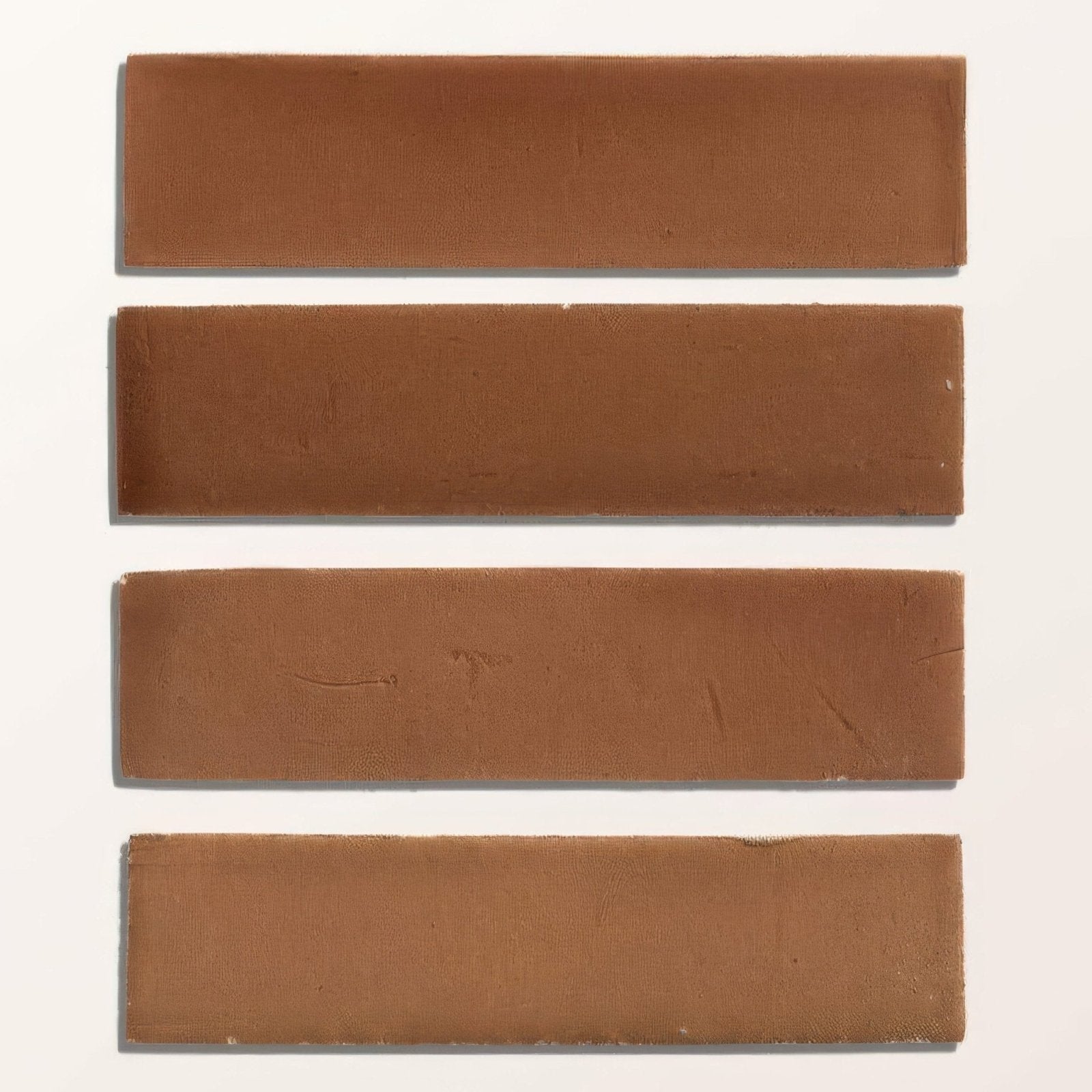 Four rectangular brown stone glaze ceramic tan gloss brick tiles arranged vertically showing glossy finish