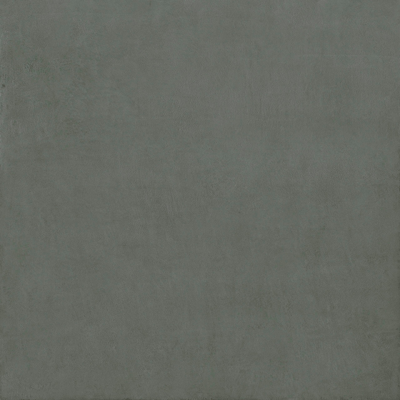 A matte gray stucco porcelain tile with a subtle textured surface for stylish flooring and wall applications