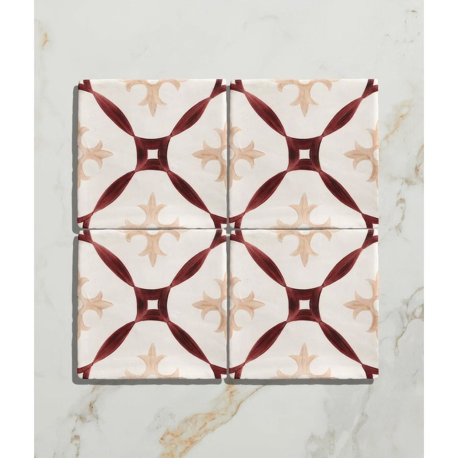 Four-square set of studio abbey red ceramic white tiles with maroon and beige geometric patterns