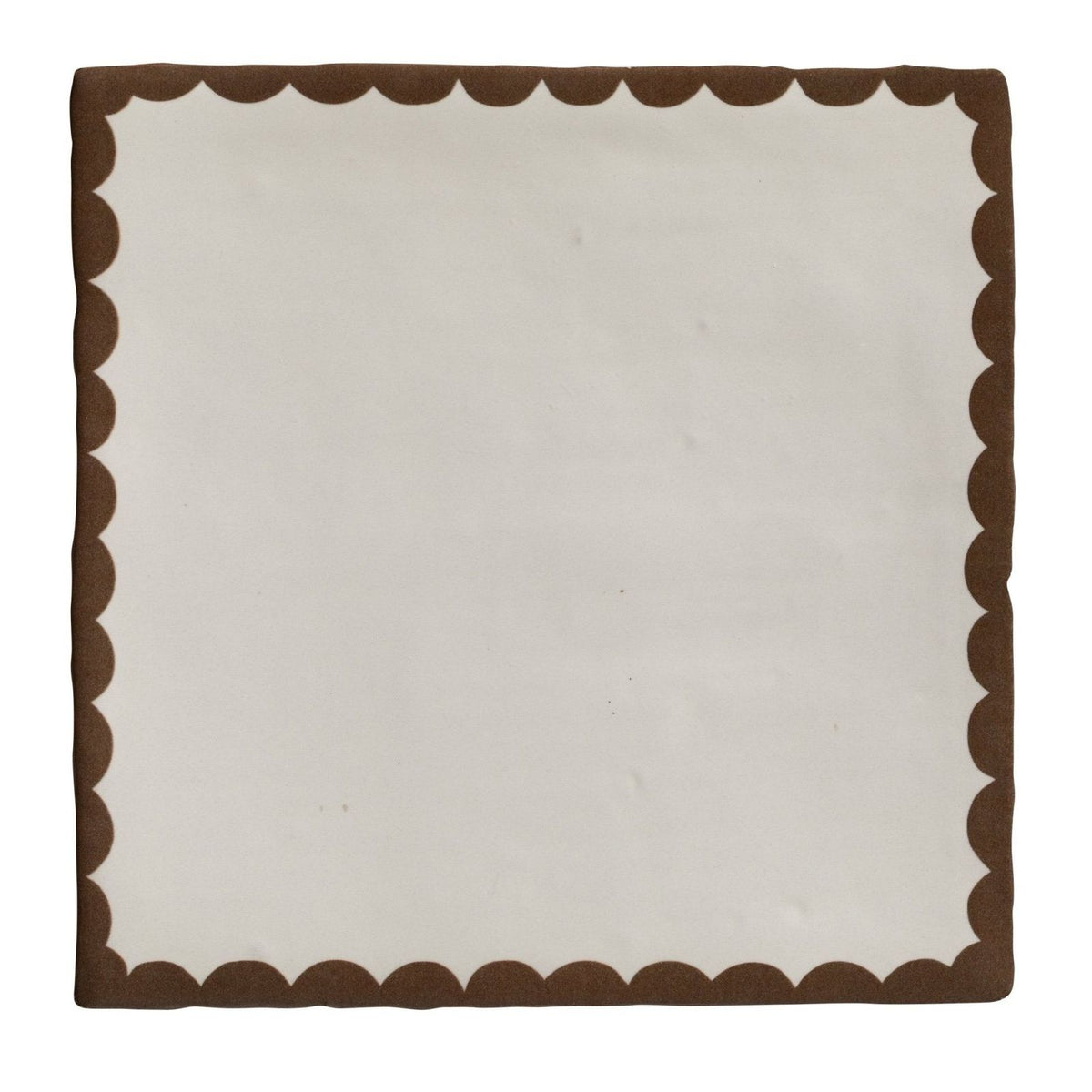 Cream-colored ceramic square napkin with scalloped brown border from studio bobbin chocolate collection