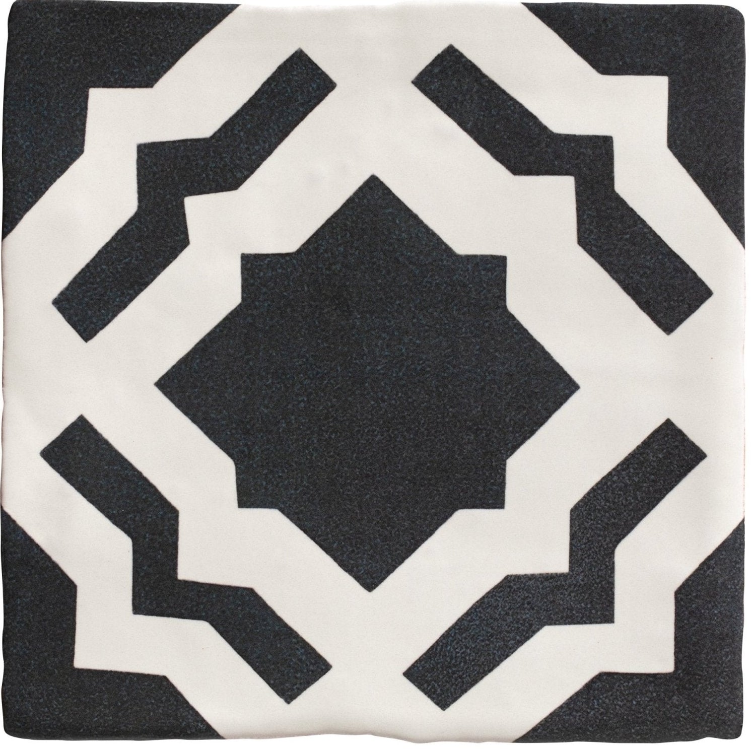 Black and white geometric patterned throw pillow designed for studio cassius blue ceramic decor accents
