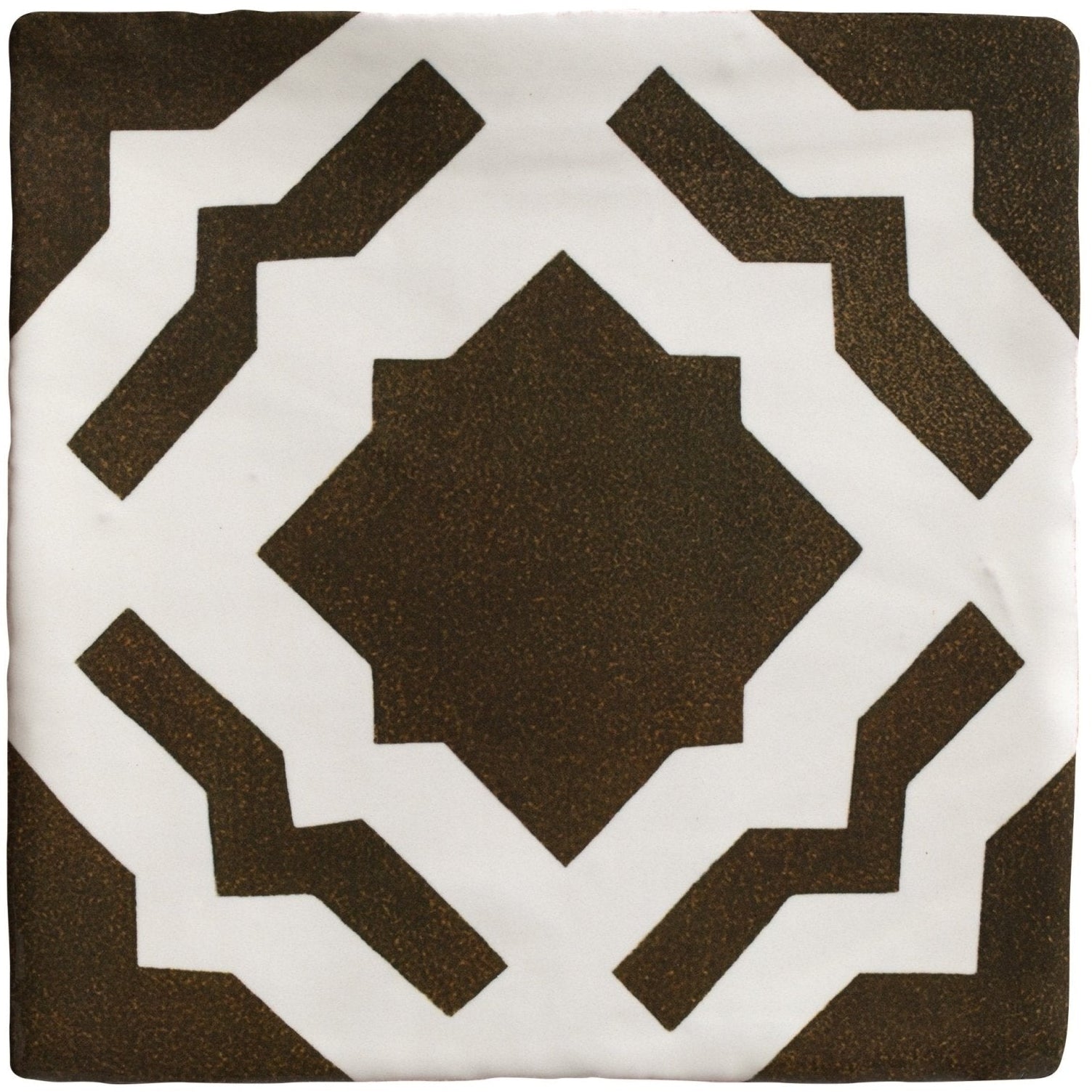 Brown and white geometric patterned throw pillow from studio cassius brown ceramic collection for home decor