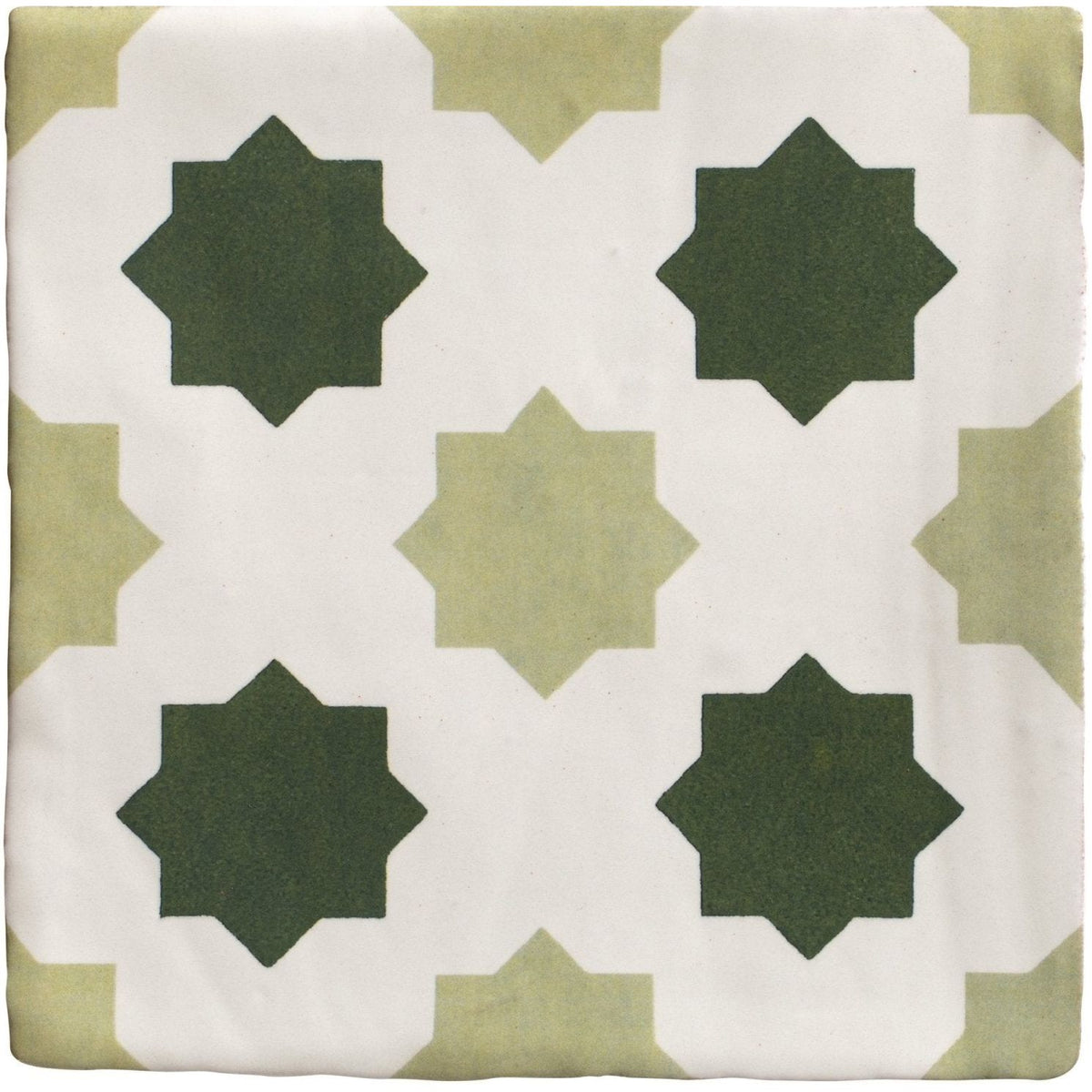 Studio cosmos jardin ceramic square tile with white base and geometric dark green eight-pointed star pattern