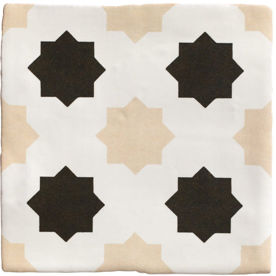 Square ceramic tile with a white beige and black geometric star pattern from studio cosmos sand ceramic collection