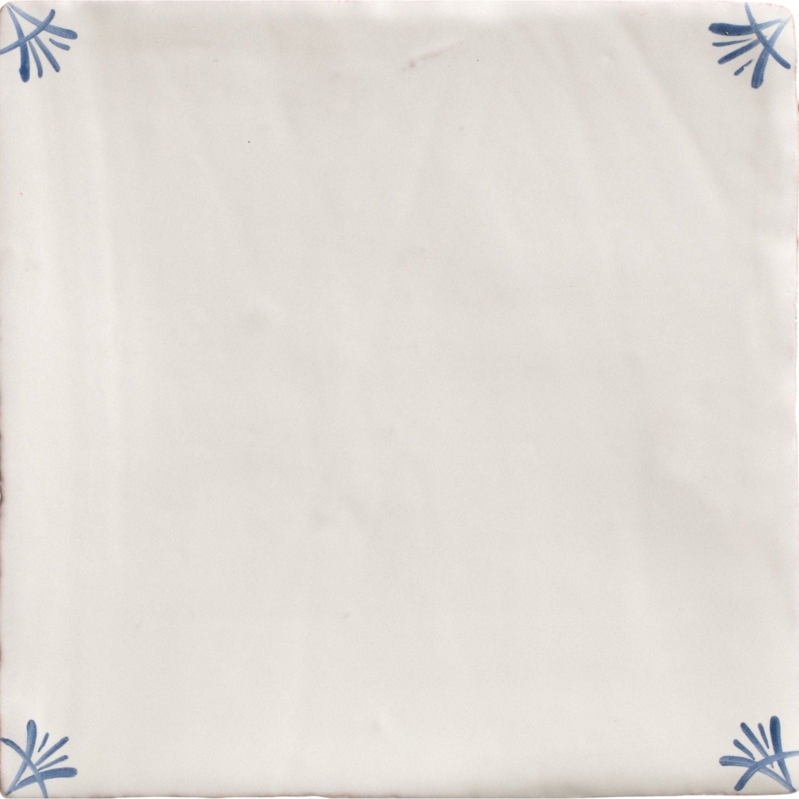 Studio nonnas kitchen classica ceramic tile in cream with delicate blue floral motifs in each corner