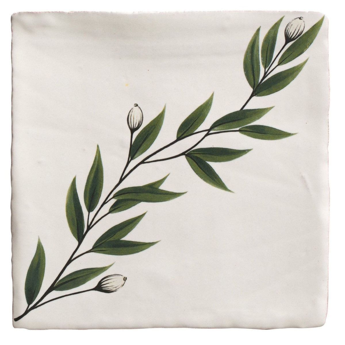 A cream-colored linen pillow sham with hand-painted green leaves and buds along the edge by studio nonna kitchen floreale ceramic