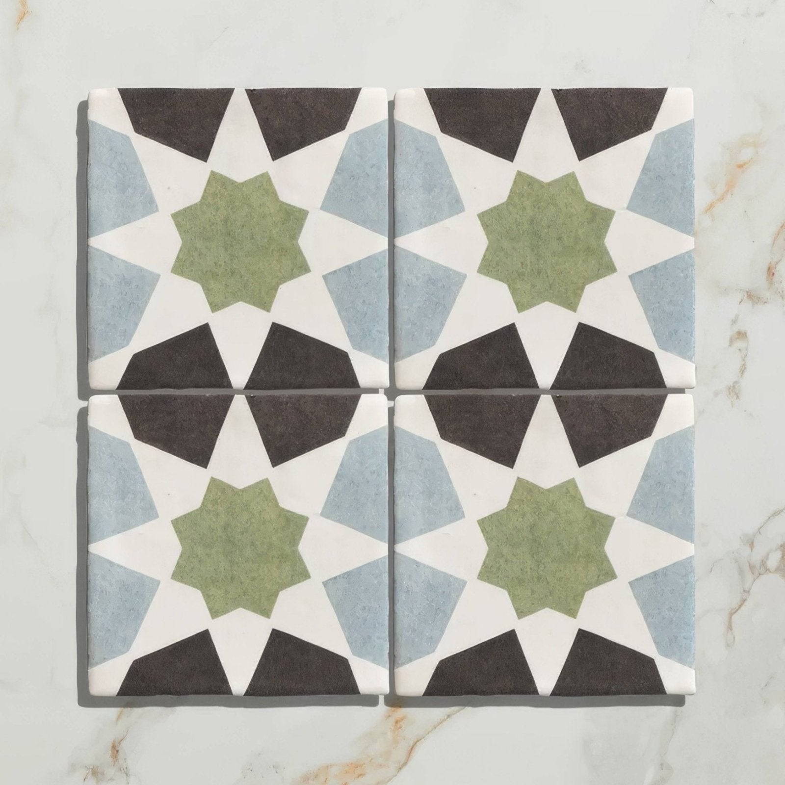 Studio souk green star ceramic four square ceramic tiles with olive green star geometric patterns on white background