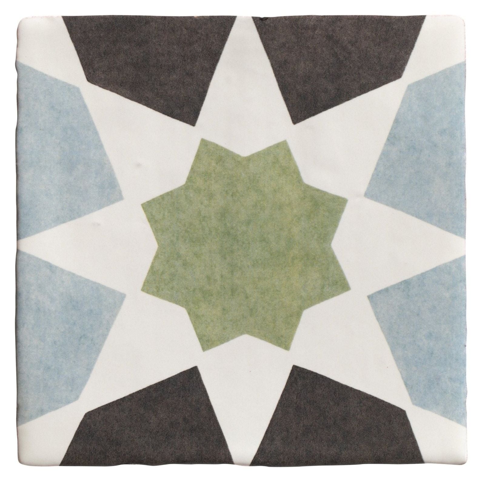 A square ceramic tile from studio souk featuring a geometric star pattern in muted green slate gray and light blue