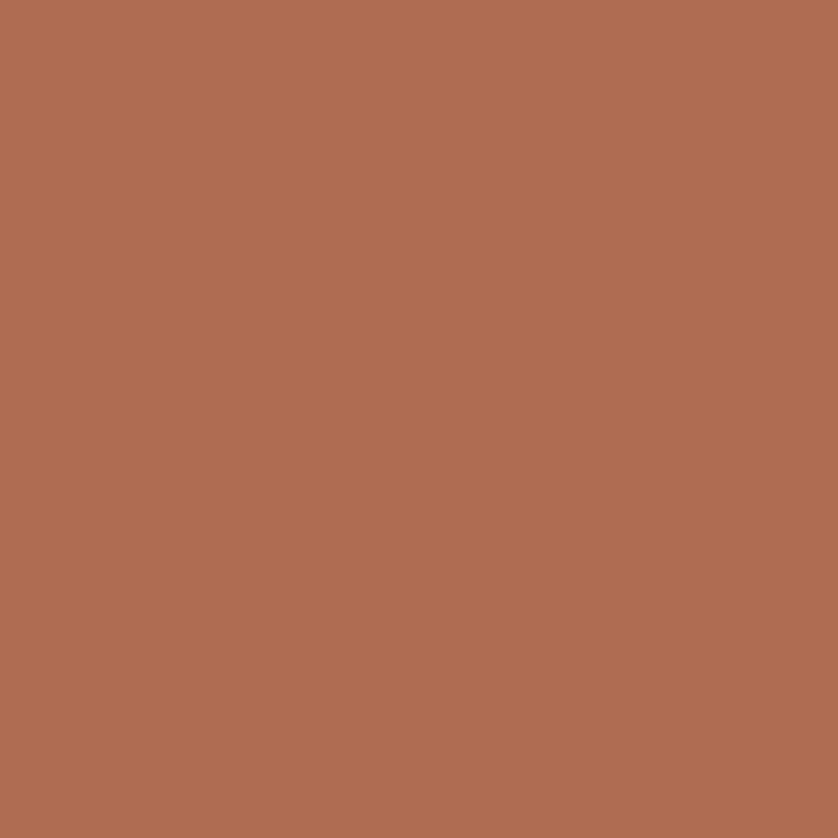 Solid rust-colored background for taos house product highlighting warm and earthy design elements