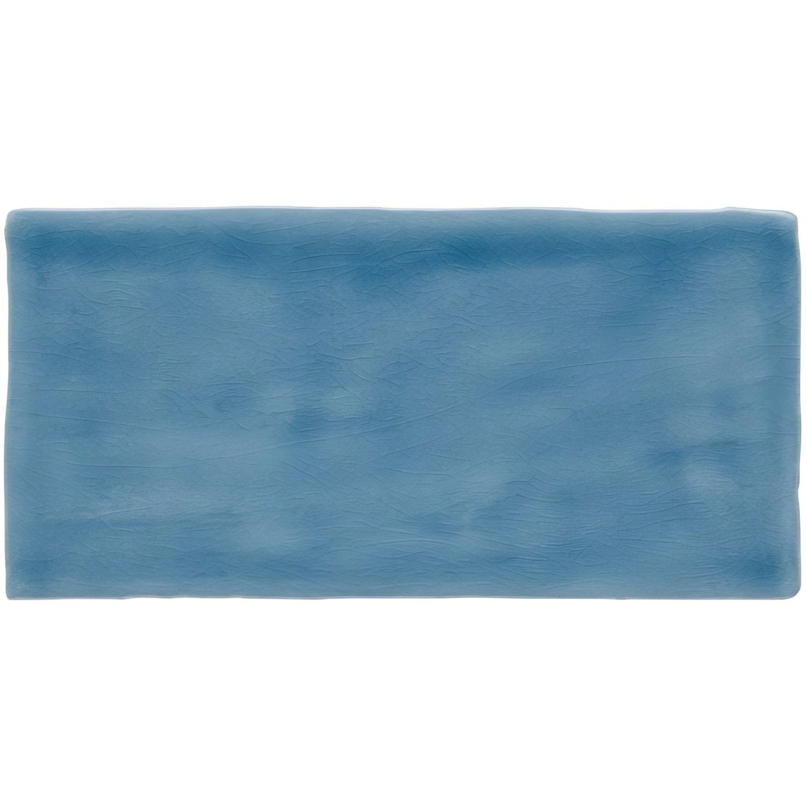 A rectangular blue ceramic brick tile teal with a textured matte finish for wall or floor use