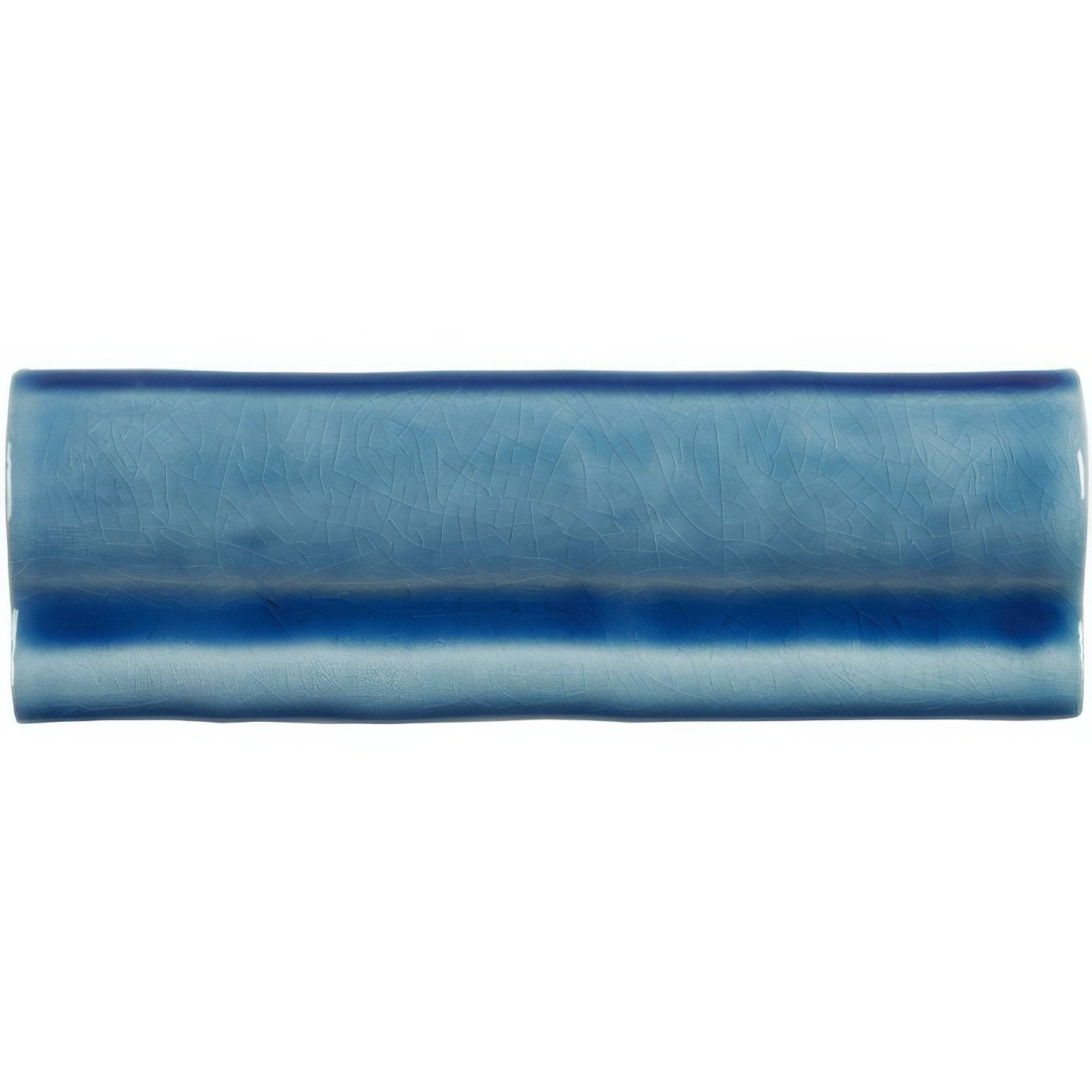 A rectangular ceramic tile with a smooth glazed surface in a gradient of teal blue hues for torus moulding