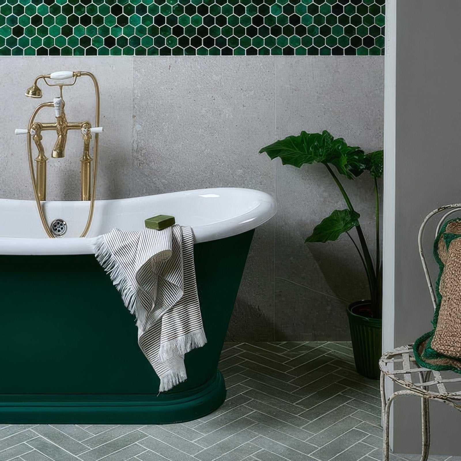 Deep emerald green freestanding bathtub with polished brass faucet and white porcelain rim tisbury porcelain 80 x 80cm