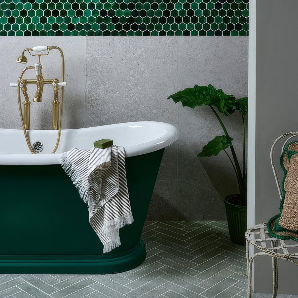 Deep emerald green freestanding bathtub with polished brass faucet and white porcelain rim tisbury porcelain 80 x 80cm