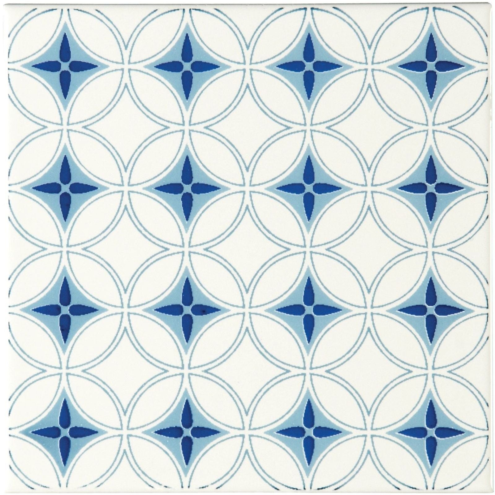 White ceramic tile toulon blue on brilliant white with repeating geometric interlocking circles and blue star motifs
