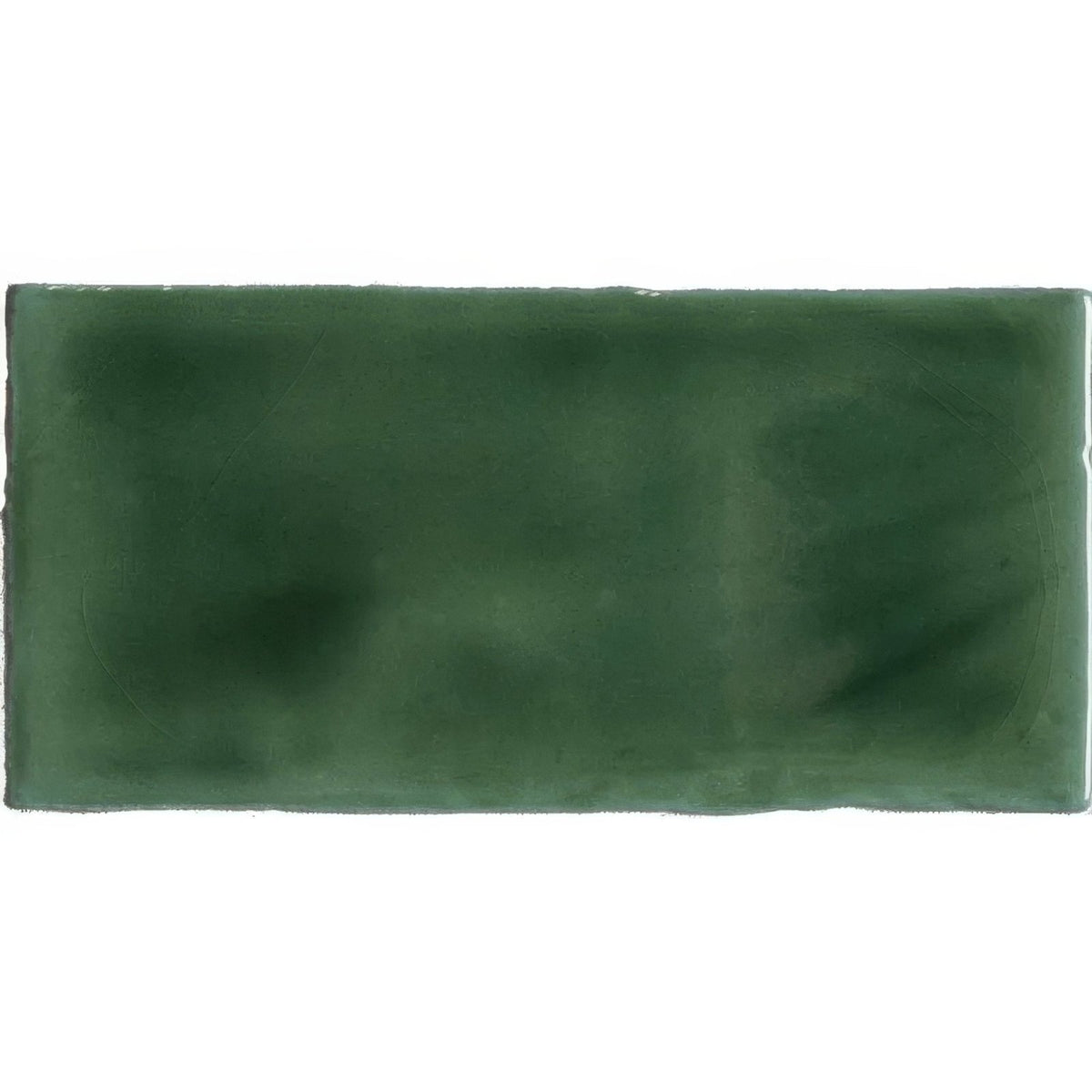 Tourmaline half tile wall tile featuring a rectangular matte dark green ceramic tile with subtle tone variation and texture