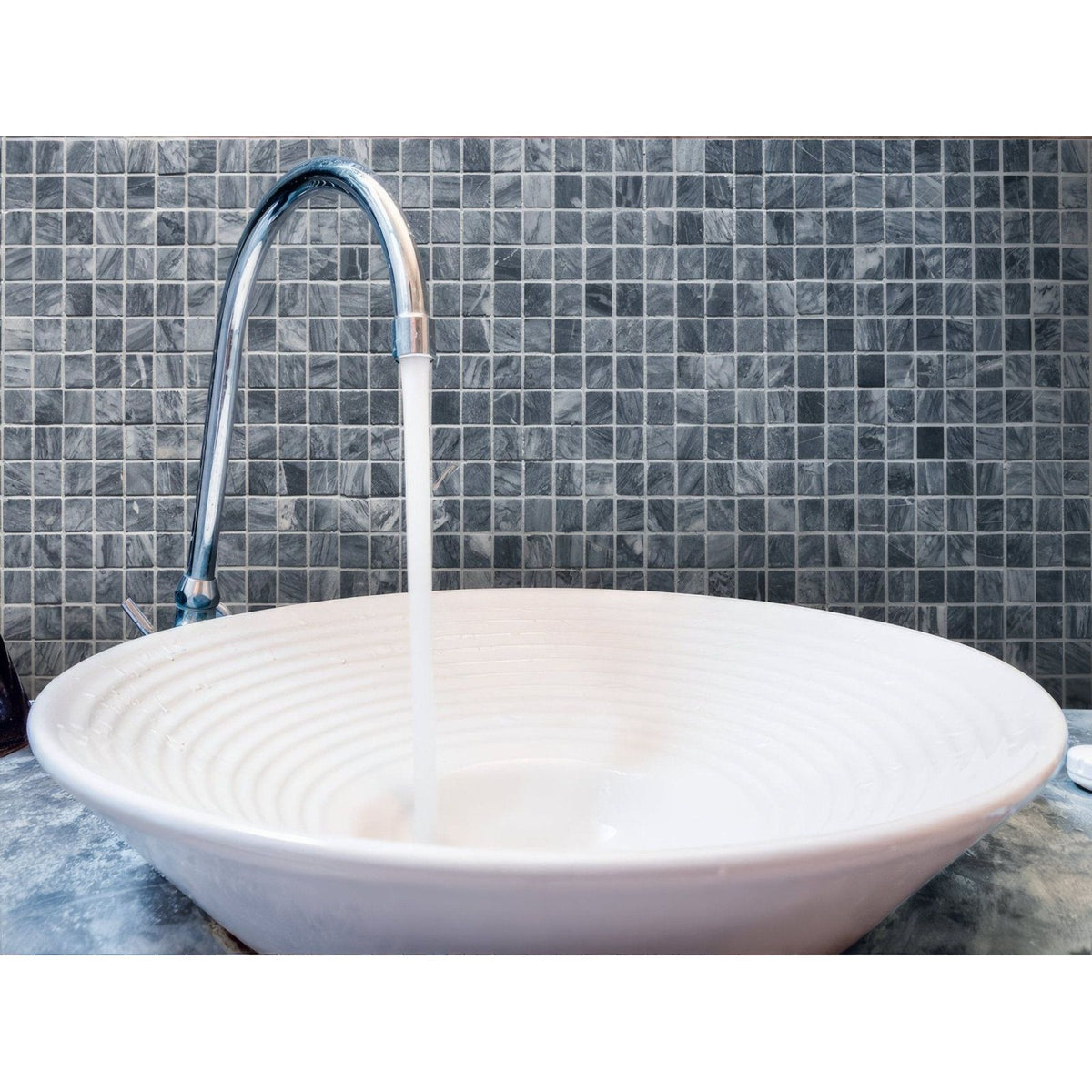 Trip Cloudy Grey Mosaic grey and white marble mosaic with a white ceramic bowl sink