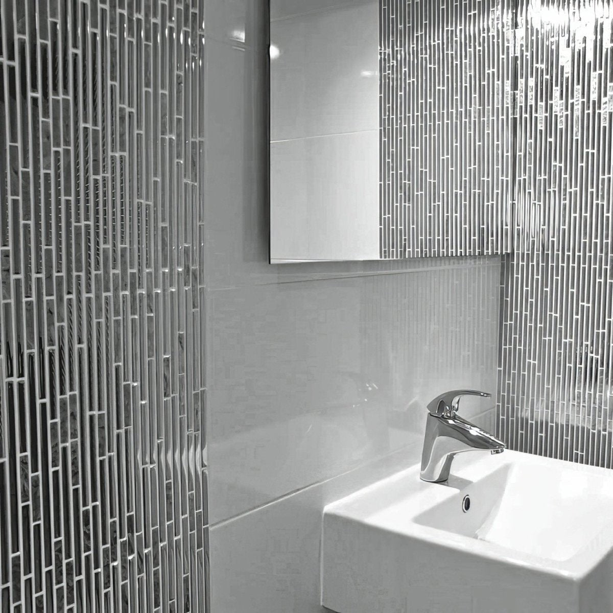 Trip Lluvia Inox Mosaic silver glass mosaic with a chrome tap and white sink