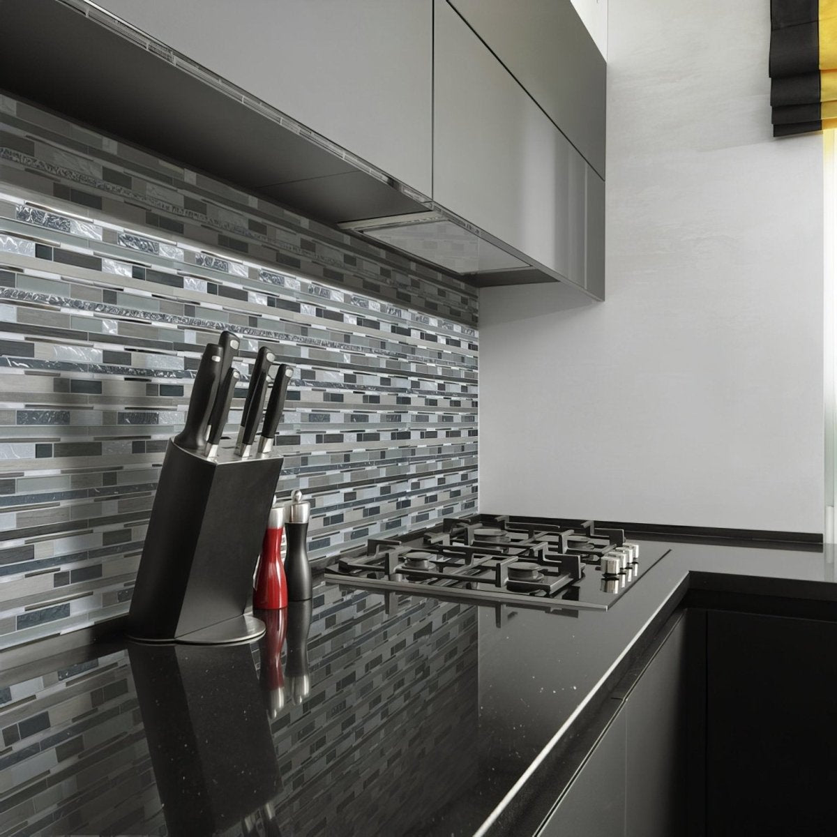Black knife block with black handles holding several knives from trip timber gris mosaic collection