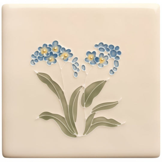 Cream-colored ceramic tile from tubelined floral collection featuring raised blue forget-me-not flowers with yellow centers