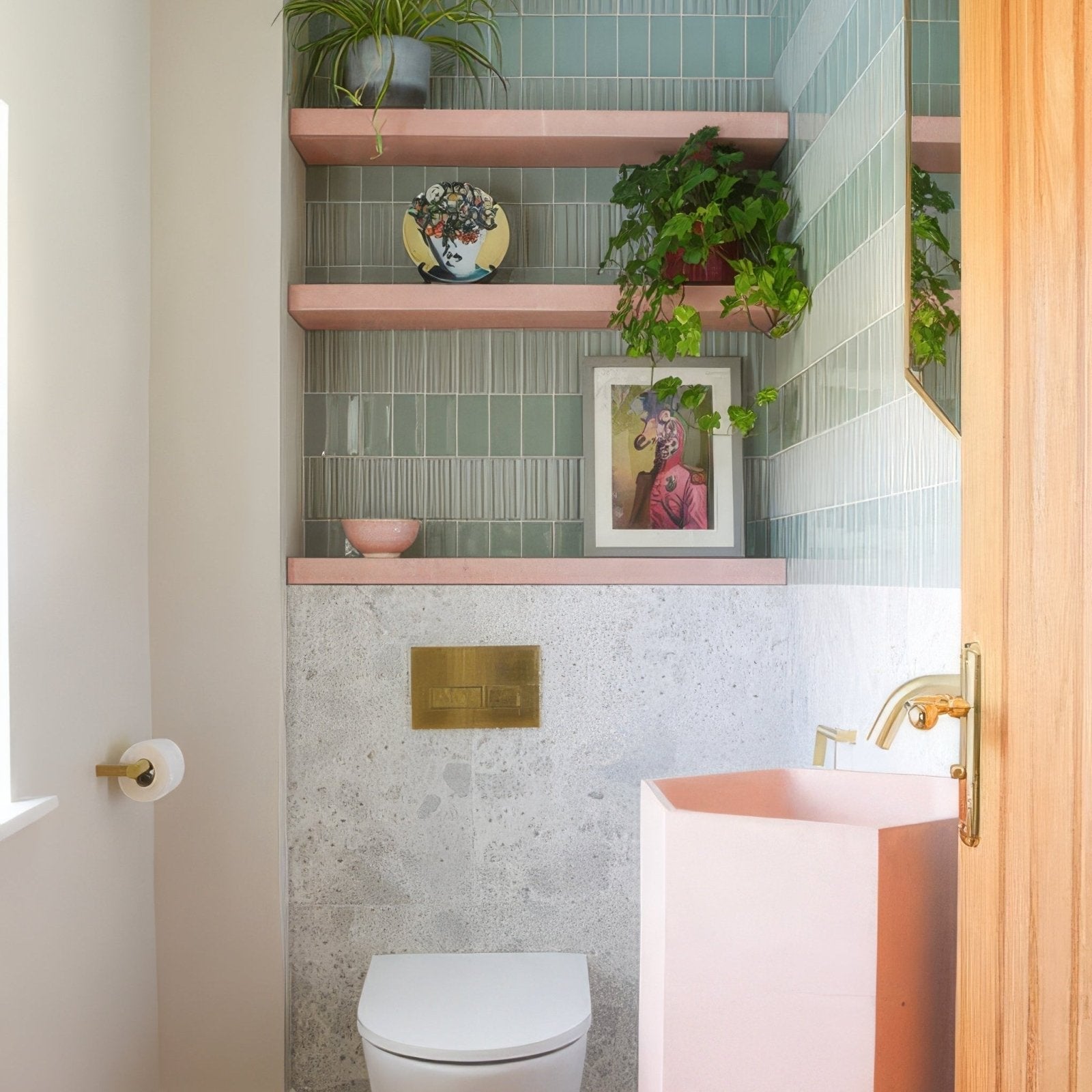 Pink hexagonal ceramic sink with fluted brick fern pattern gold faucet and matching pink shelves above