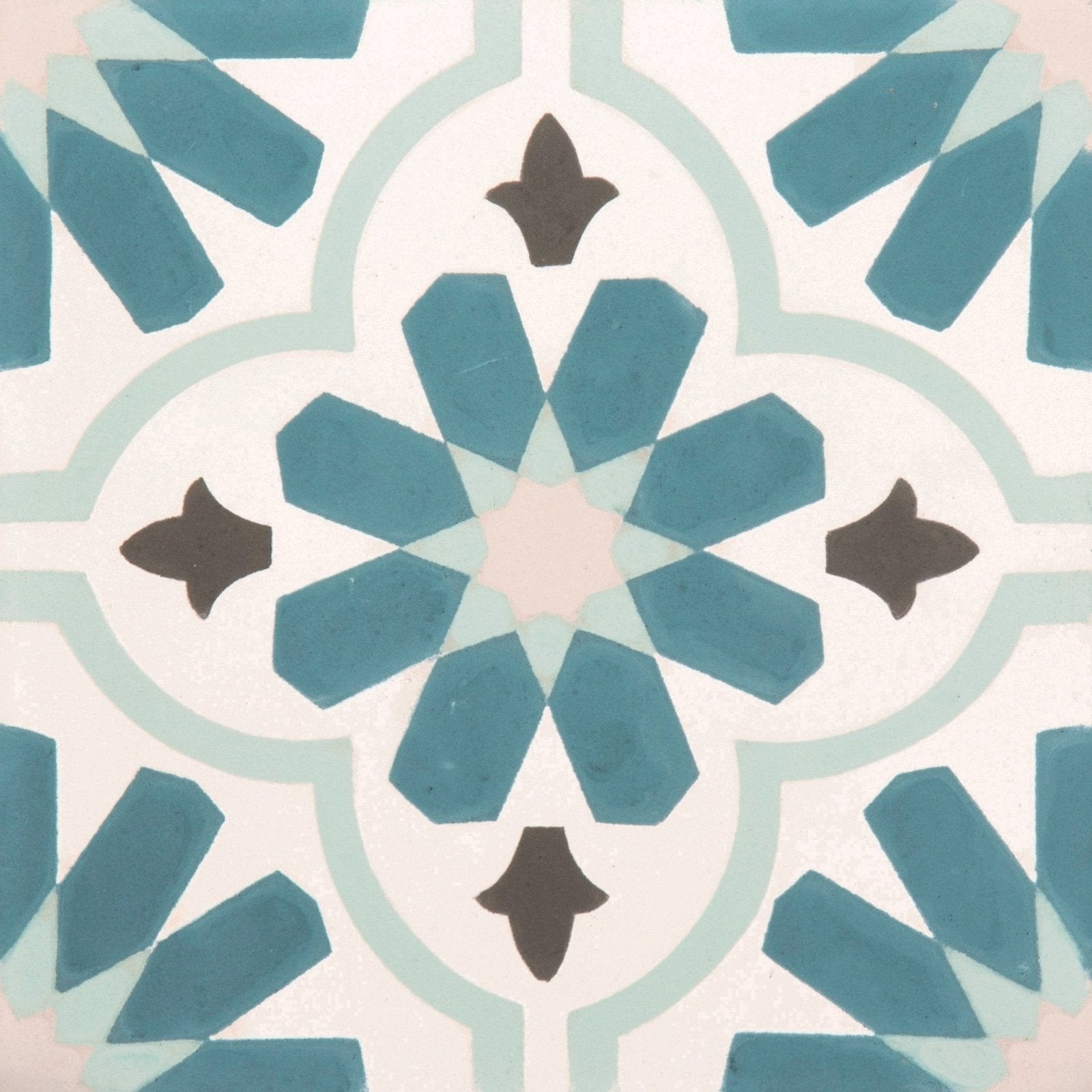 Vacation porcelain cordoba tile features blue and white geometric starburst pattern with dark brown fleur-de-lis accents