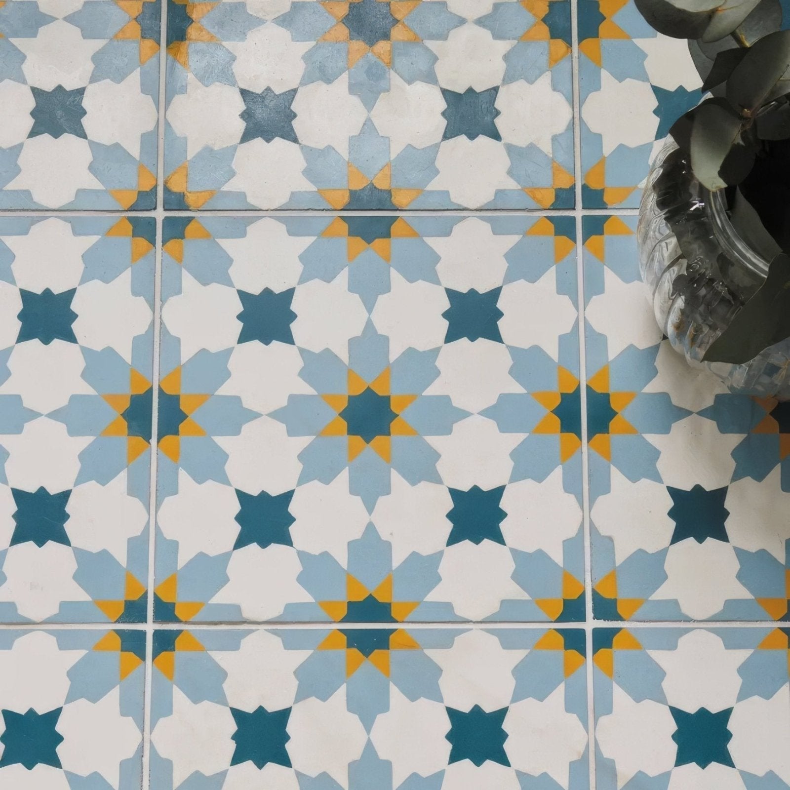 Blue and white geometric patterned porcelain floor tiles with yellow accents vacation porcelain tangier design
