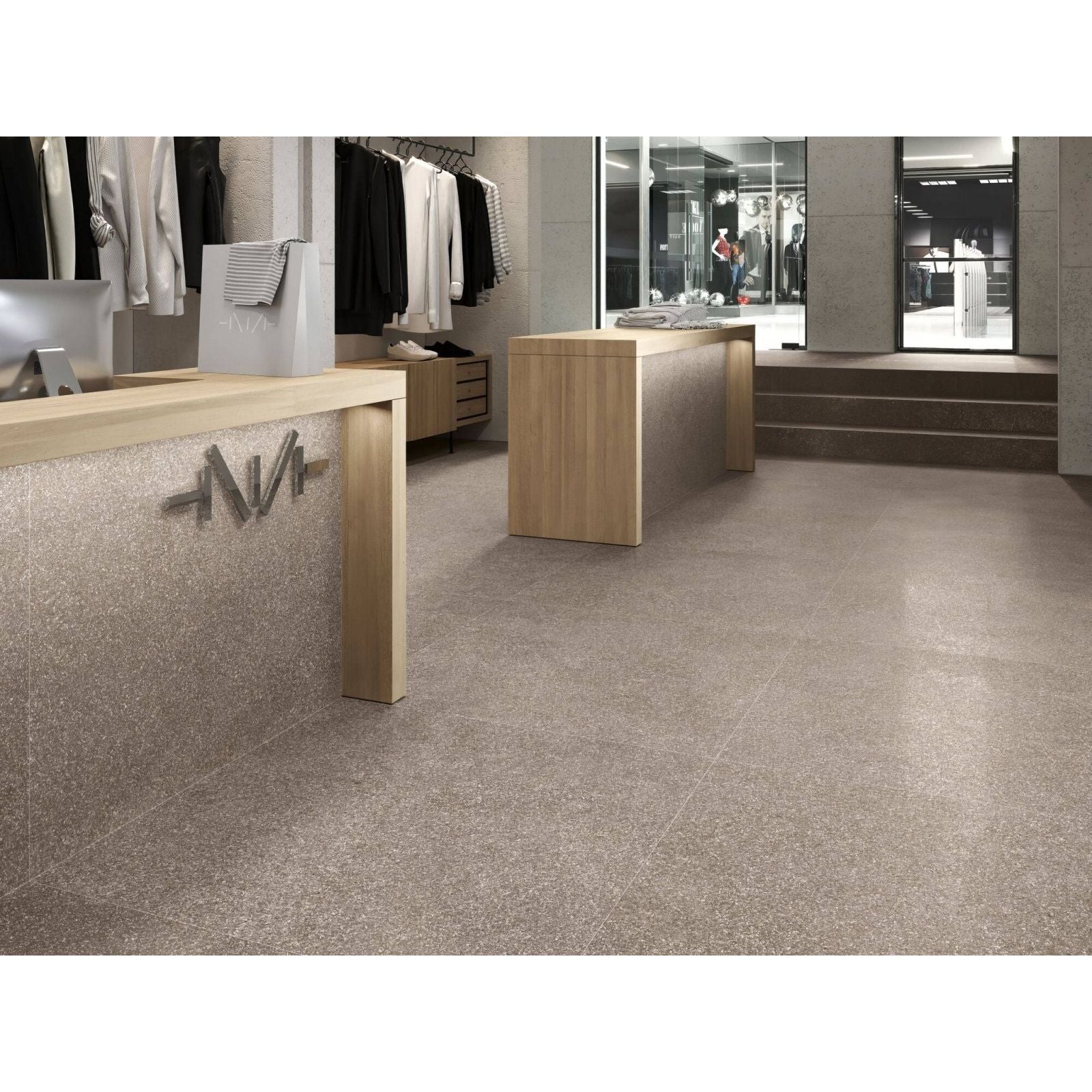 Verona 1831 stone matt retail space with sleek minimalist wooden furniture and large glass windows