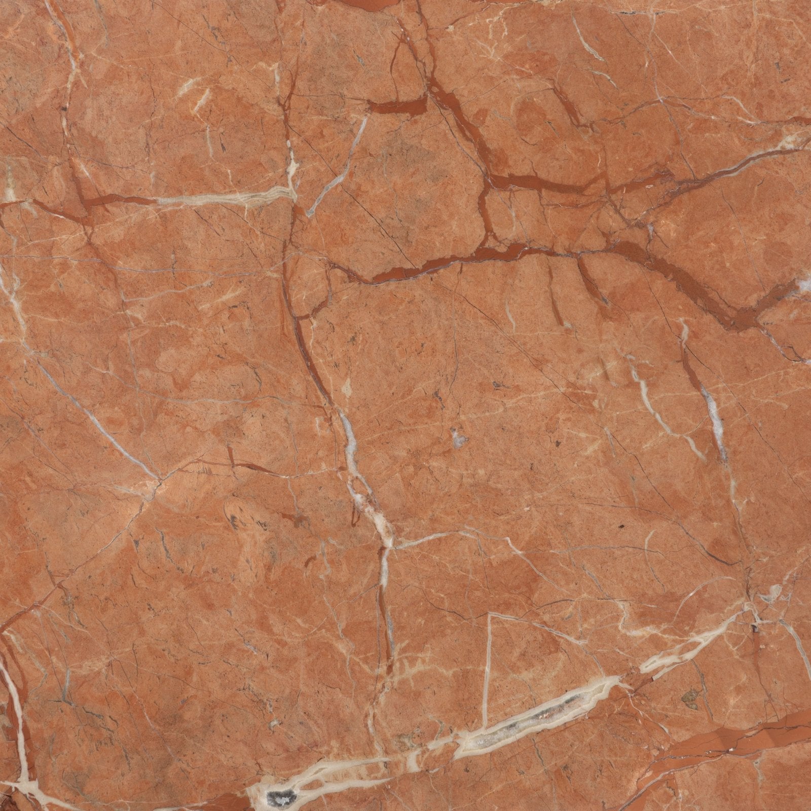 Versailles marble rouge honed terracotta marble surface with intricate white and gray veining patterns