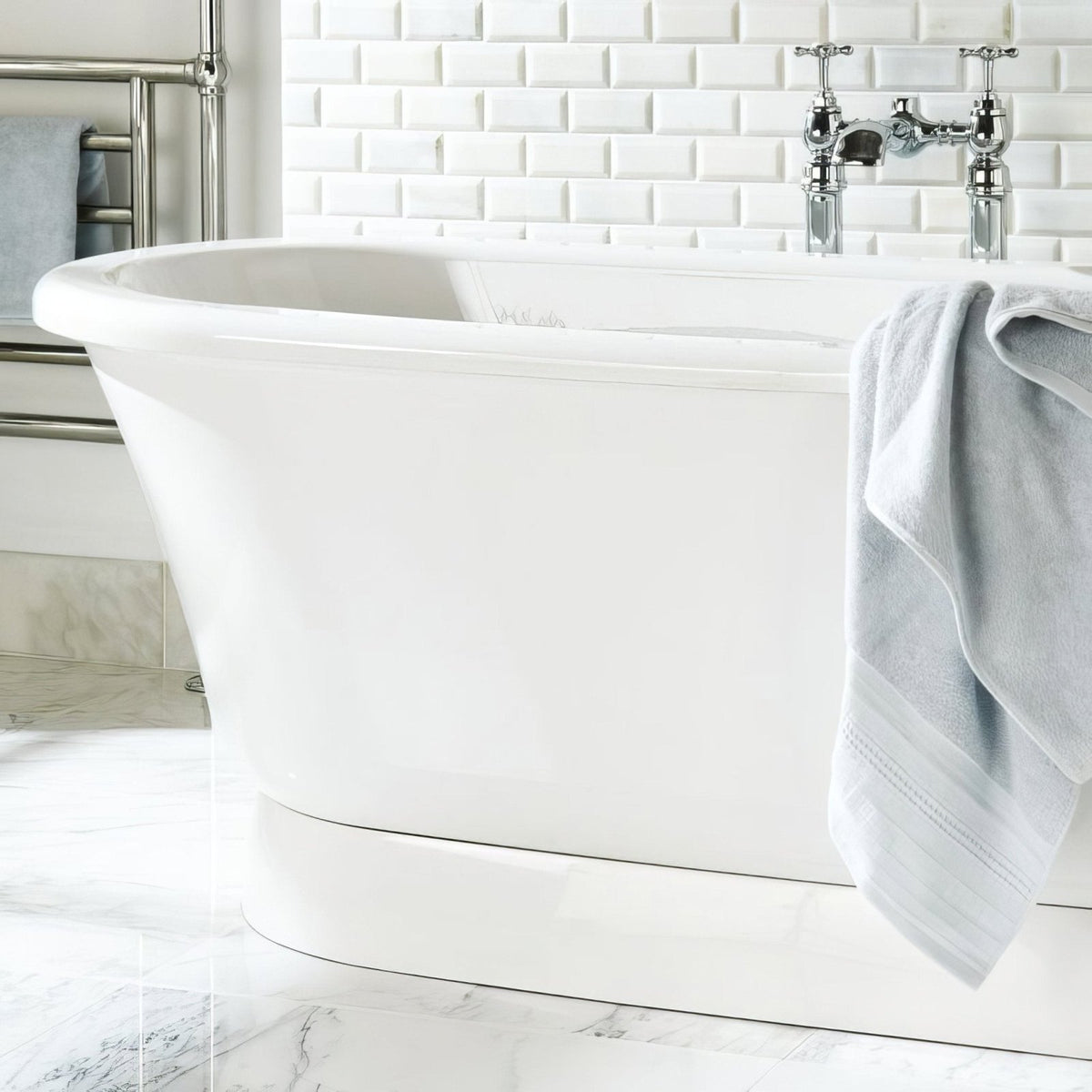 Viano White Polished Bevel Marble 147 x 72mm white bevelled marble metro tiles with a freestanding bathtub