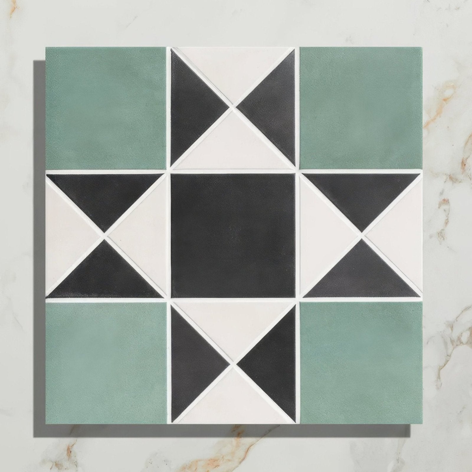Square mosaic tile with geometric star pattern in matte sage green black and white porcelain finchley pattern forest green