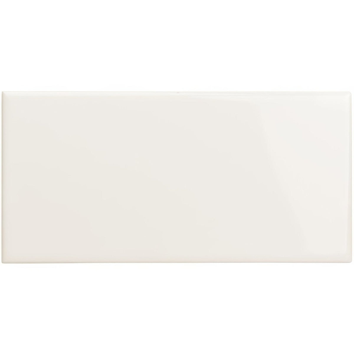 Cream-colored vintage white half tile with a glossy finish in rectangular ceramic design for wall use