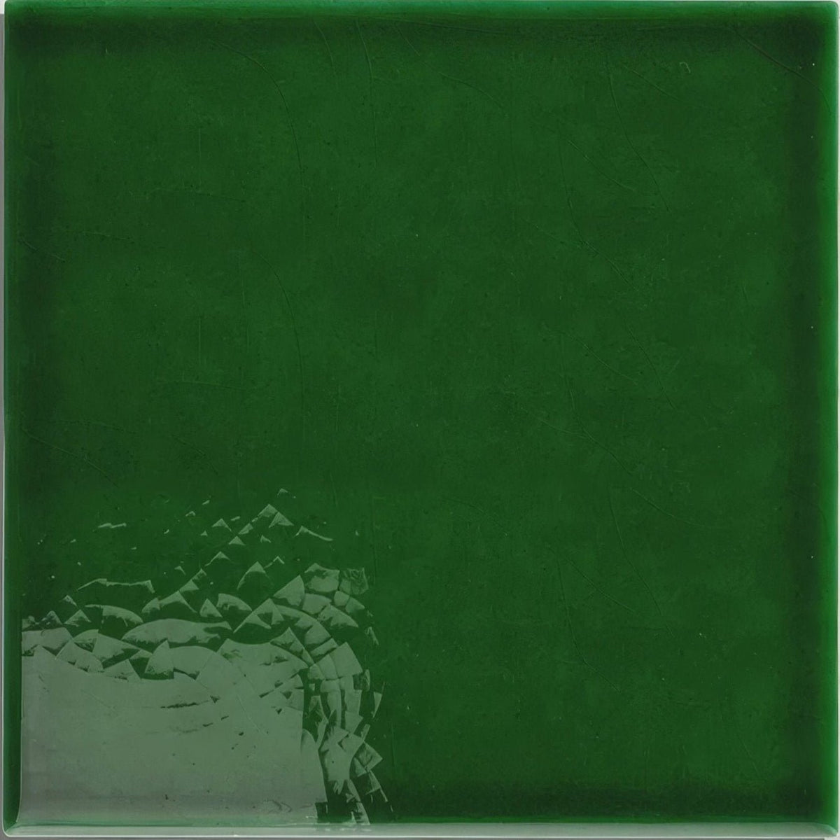 Dark green victorian style wall ceramic tile with olive green crackle glaze and subtle textured abstract geometric pattern