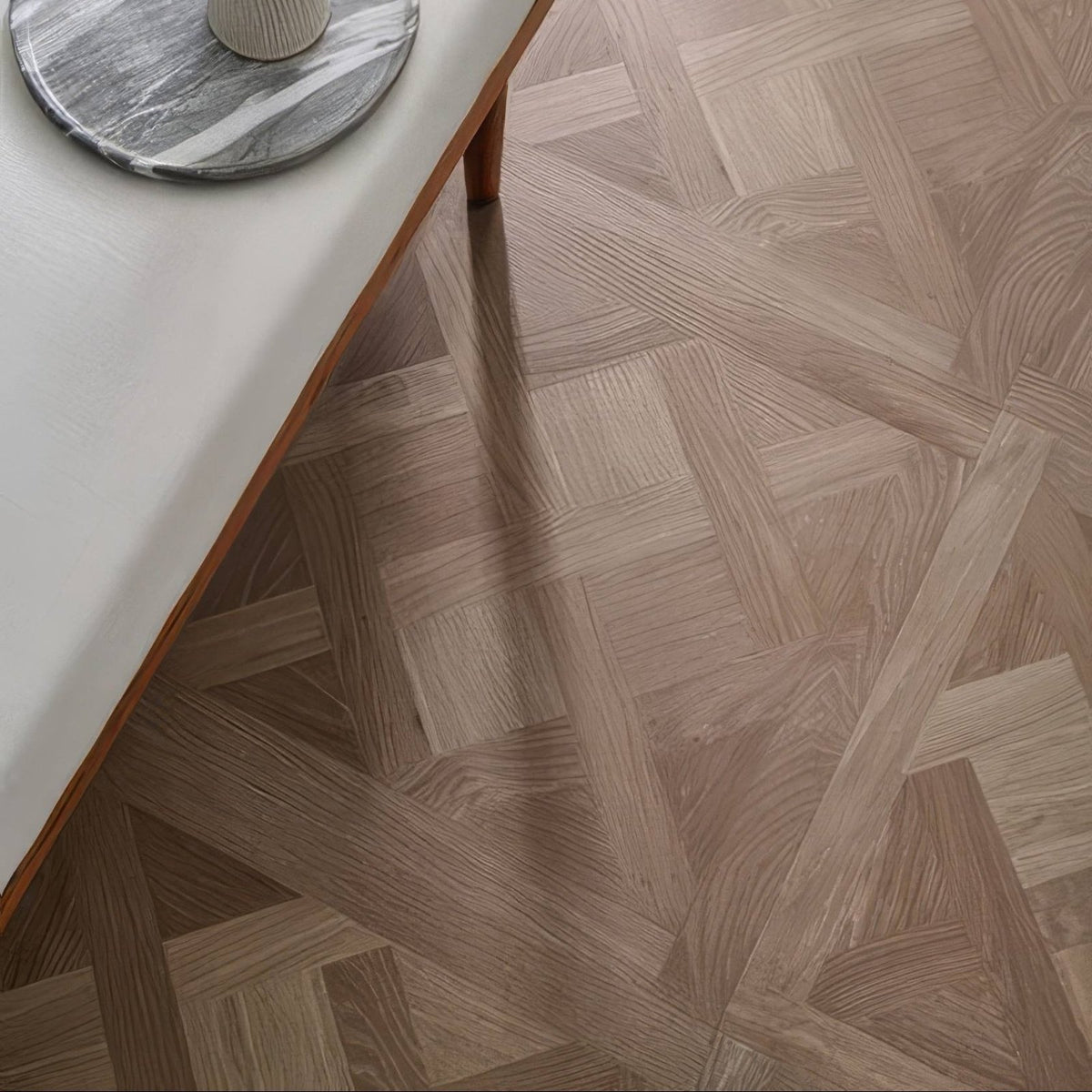 Light brown wooden floor panel with herringbone pattern made from oak in warwick emrys oak design panel