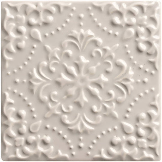 Off-white ceramic tile waveney highgrove with raised floral and dot patterns for decorative wall use