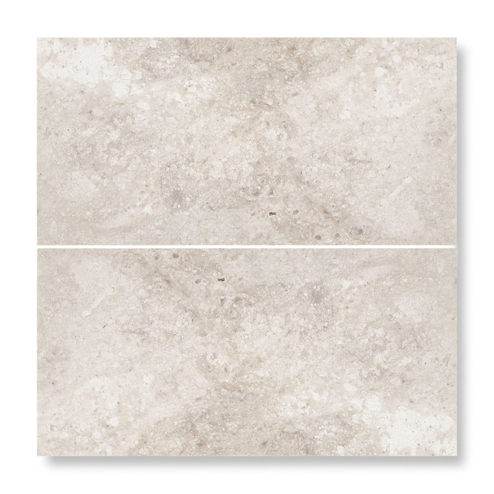 Two light gray westhampton diamond sawn edge 7 x 14cm stone tiles with natural textured surface and tone variations