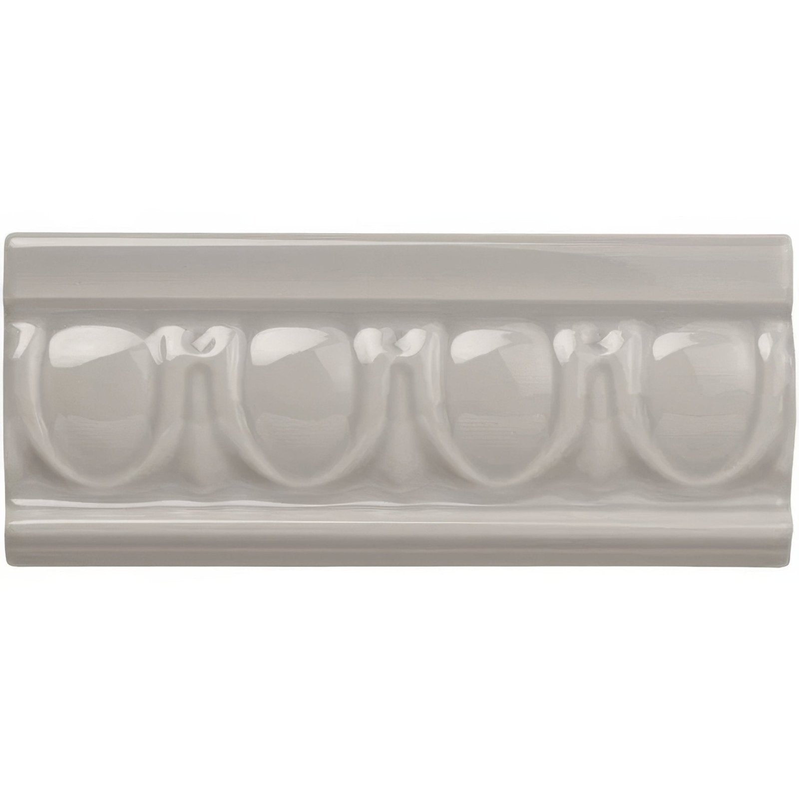 A sleek glossy off-white ceramic tile with classic grey egg and dart moulding featuring repeating rounded arches