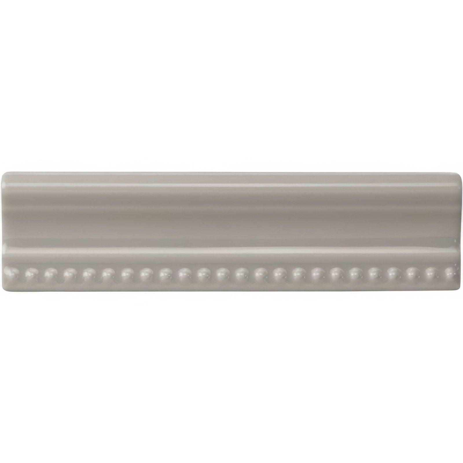 Beige ceramic tile with smooth glossy finish and decorative beaded edge from westminster grey hogarth moulding