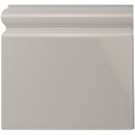 A sleek glossy gray ceramic baseboard with a classic molded profile in westminster grey skirting left design