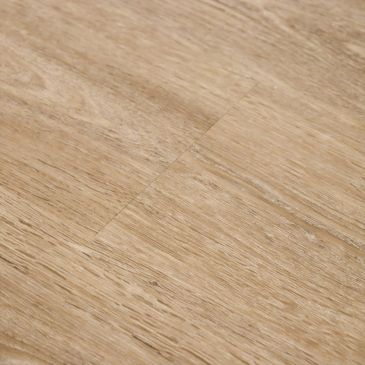 Light beige vinyl plank flooring with realistic wood grain texture called Weymouth Almond Oak for durable interiors