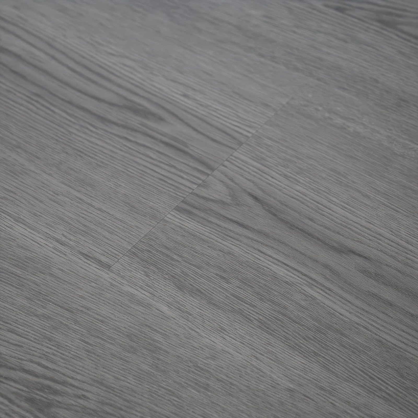Gray wood-grain laminate flooring with a smooth modern finish in weymouth echo oak design