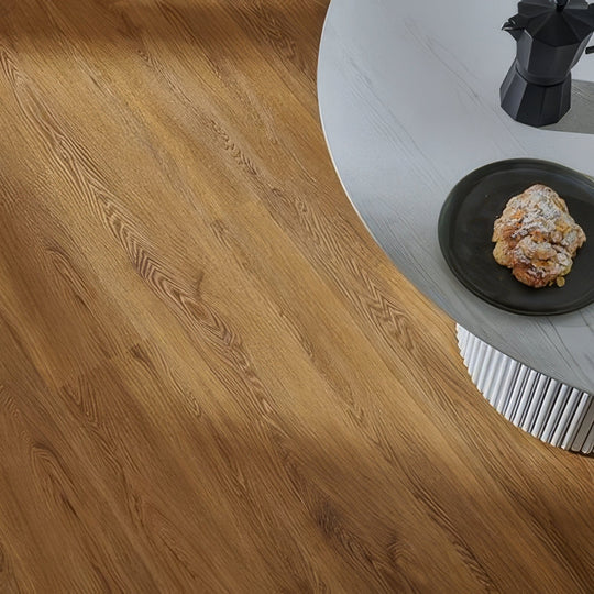 Warm-toned wooden floor with natural grain pattern made from Weymouth millhouse oak for stylish interior flooring
